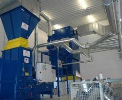 Absaug- und Entsorgungsanlage in einem Druckzentrum / Extraction and waste disposal system of a printing plant