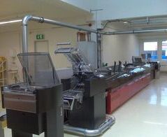 Absaug- und Entsorgungsanlage in einem Druckzentrum / Extraction and waste disposal system of a printing plant