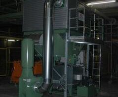 Absauganlage mit Brikettierpresse an einer Hülsenschneidmaschine / Extraction system with a briquetting press on an cartridge cutting machine