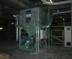 Absauganlage mit Brikettierpresse an einer Hülsenschneidmaschine / Extraction system with a briquetting press on an cartridge cutting machine