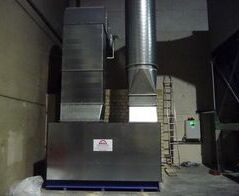 Absauganlage zur Entstaubung von Stanzabfällen in einem Wellpappenwerk / Extraction system for punching in a corrugated cardboard plant