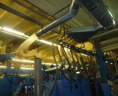 Absauganlage zur Entstaubung von Stanzabfällen in einem Wellpappenwerk / Extraction system for punching in a corrugated cardboard plant