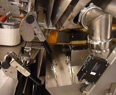Absaug- und Entsorgungsanlage für Brotabschnitte / Extraction and waste disposal system for end plates