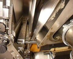 Absaug- und Entsorgungsanlage für Brotabschnitte / Extraction and waste disposal system for end plates