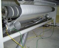 Absaug- und Entsorgungsanlage für Randstreifen mit zwei vollautomatischen Verdichtungsanlagen / Extraction system for edge strip incl. two press plants