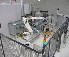 Absauganlage für Glaspapierzwischenlagen bei der Photovoltaikproduktion / Extraction system for glass paper layers in the photovoltaic production