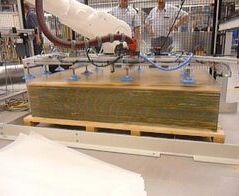 Absauganlage für Glaspapierzwischenlagen bei der Photovoltaikproduktion / Extraction system for glass paper layers in the photovoltaic production