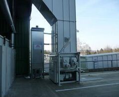 Absauganlage an einem Schneckenverdichter für Kartonagen / Extraction of a screw compactor for cardboard