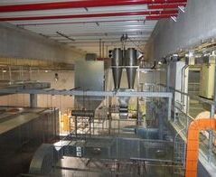 Extraction system for end plates on slicer and bread rolls with separate vacuum system