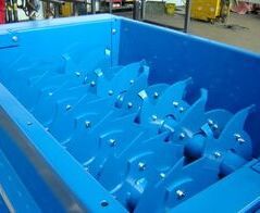 Extraction and disposal facility for cartons with cardboard shredder