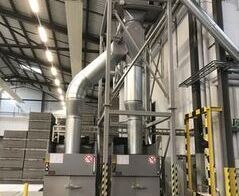 Round bale compacting system